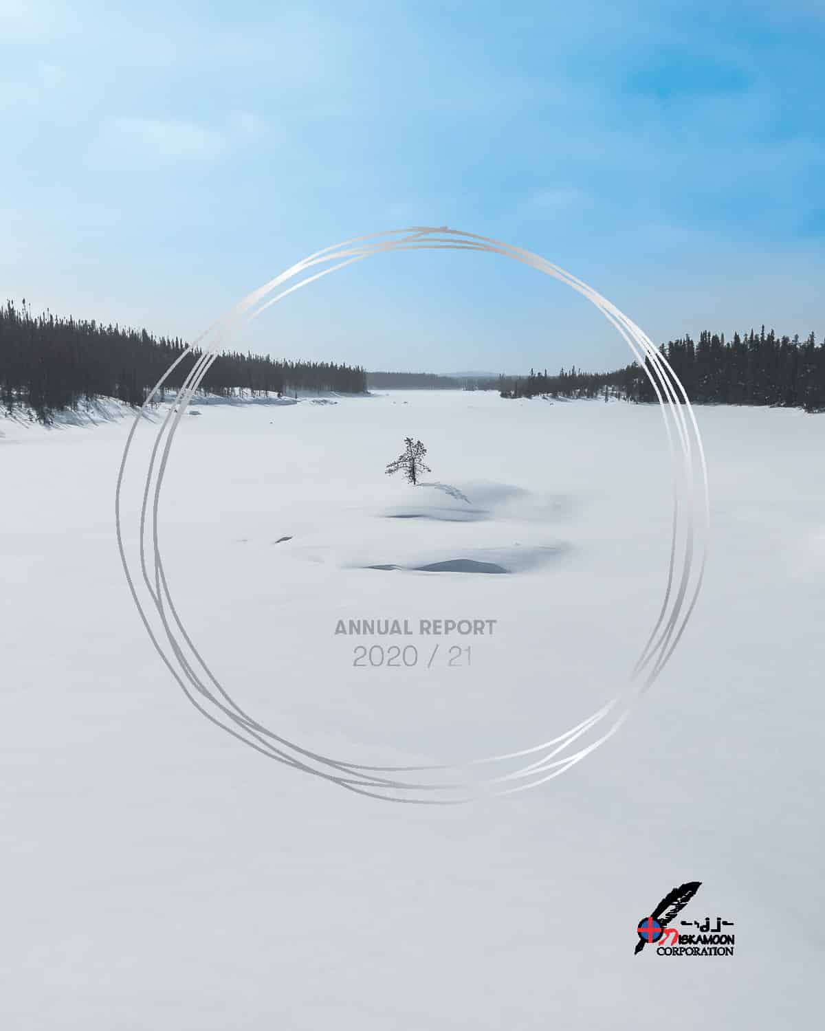 A snowy landscape with a frozen river and distant trees under a blue sky. Text reads "Annual Report 2020-2021." The Denélǫn̨é Corporation logo is displayed in the lower right corner.
