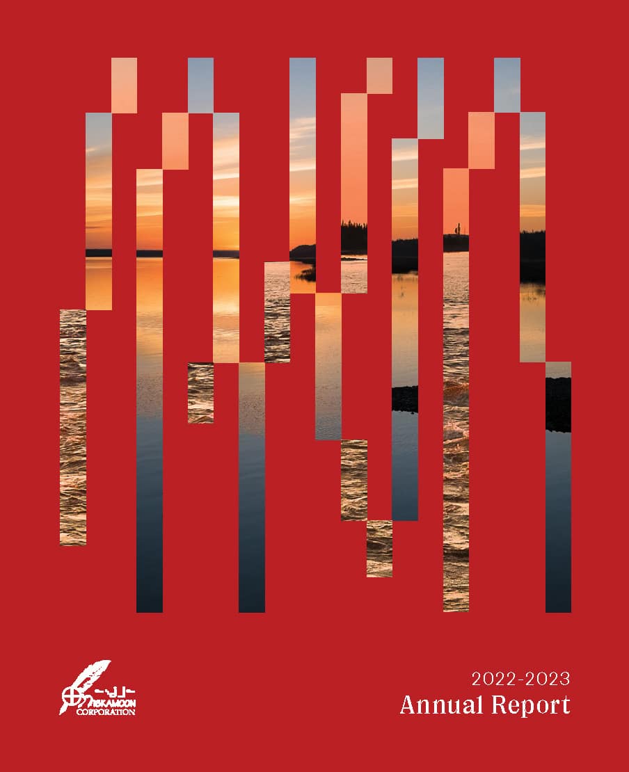 A red cover featuring vertical bars revealing a sunset landscape over a lake, with a feather logo and "2022-2023 Annual Report" text at the bottom right-hand corner.