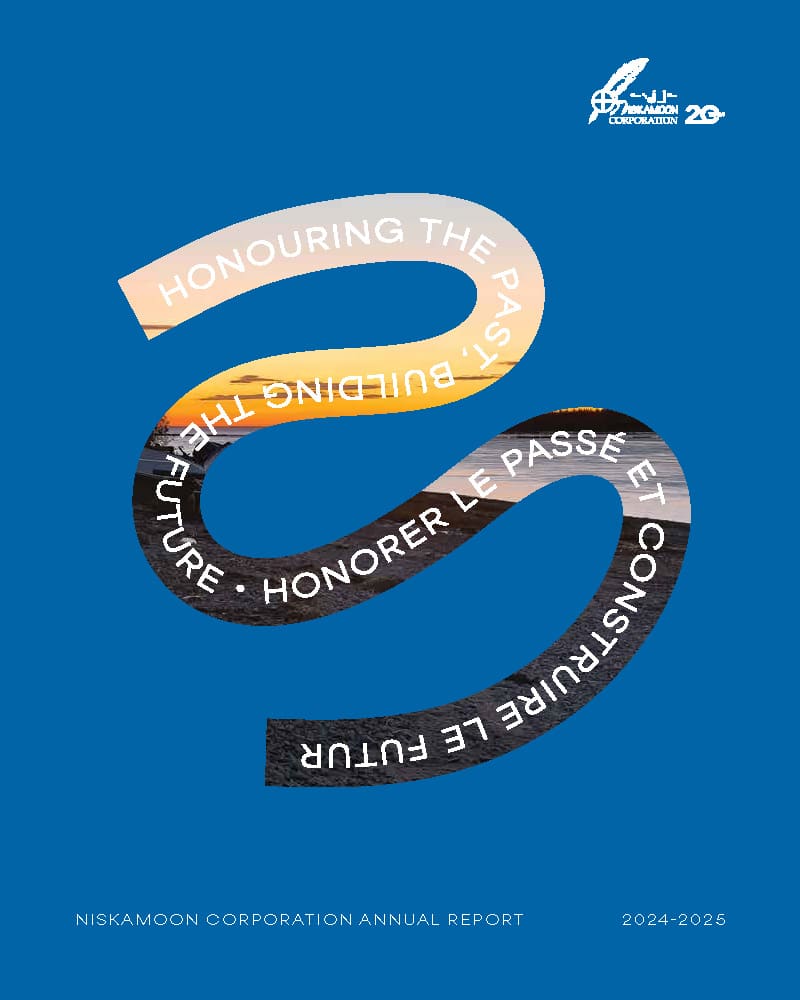 A blue cover featuring a large white “S” shape and the text “Honouring the Past - Building the Future” in English and French over a sunset road. Logos and "Niskamoon Corporation Annual Report 2024-2025" appear at the bottom.